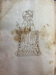 Livre de protocoles notariés avec le pantocrator dessiné