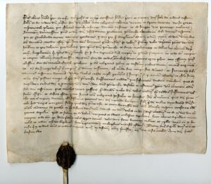 Permis du prieur de la Grande Chartreuse d'enterrer les histoires de Prades dans la Chartreuse d'Escaladei. 1333, octobre, Monastère de la Chartreuse de Gande (Alpes françaises, près de Grenoble).